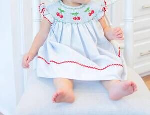 NEW MARCO & LIZZY cherries hand smocked bishop dress in blue/ red